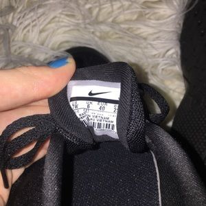 Black Nike running sneakers